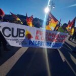 Confederazione Unitaria di Base Vicenza marcia con la bandiera Fermiamo il genocidia Palestina libera!